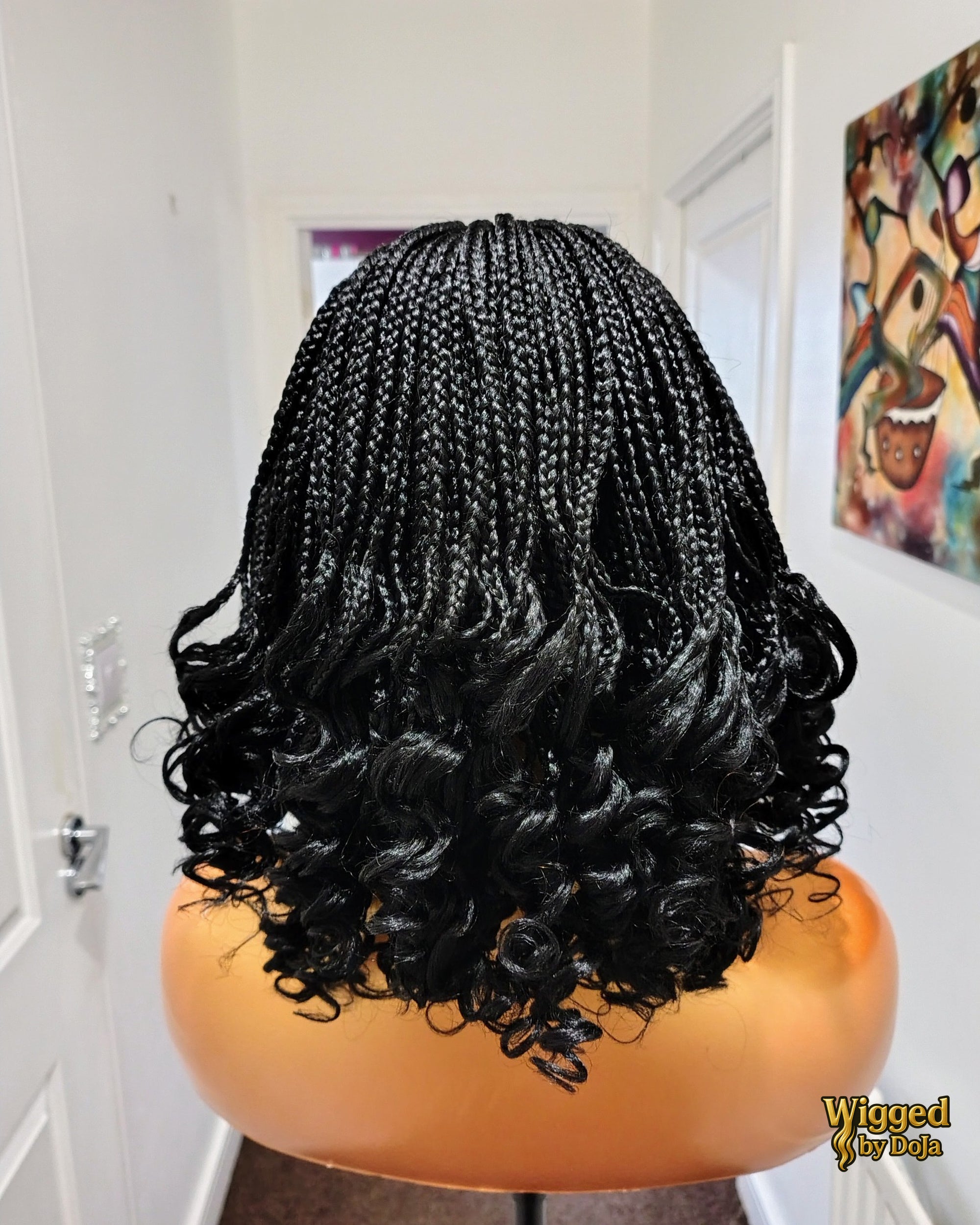 Fii centre part cornrow braids