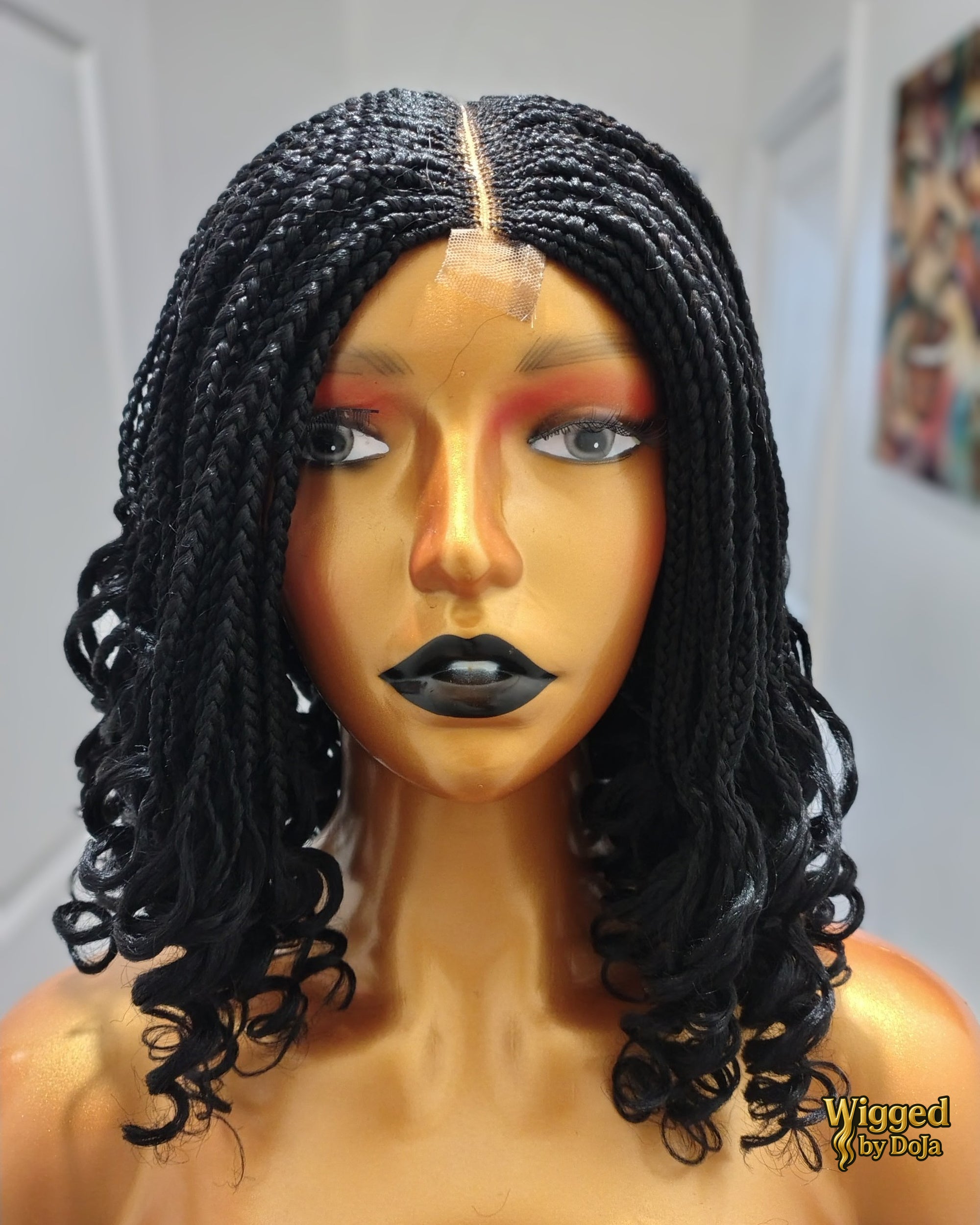 Fii centre part cornrow braids